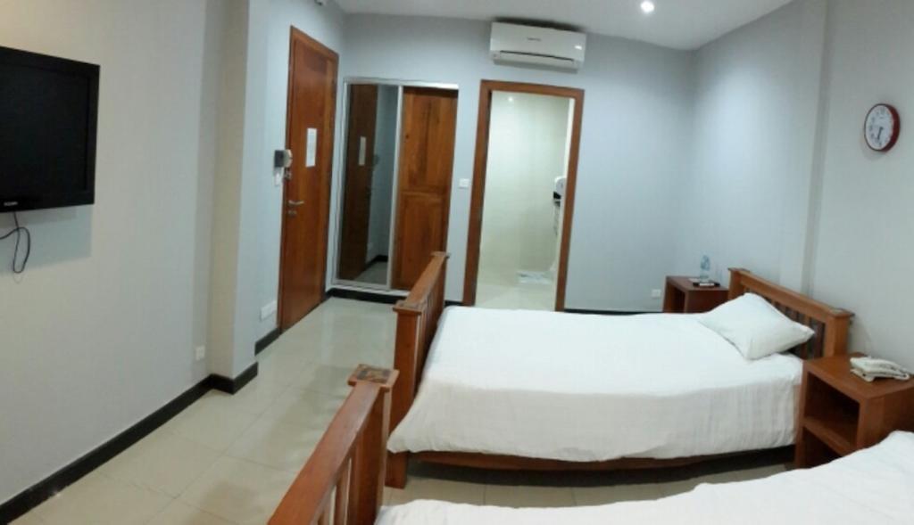 Dodo Guesthouse Phnom Penh Quarto foto